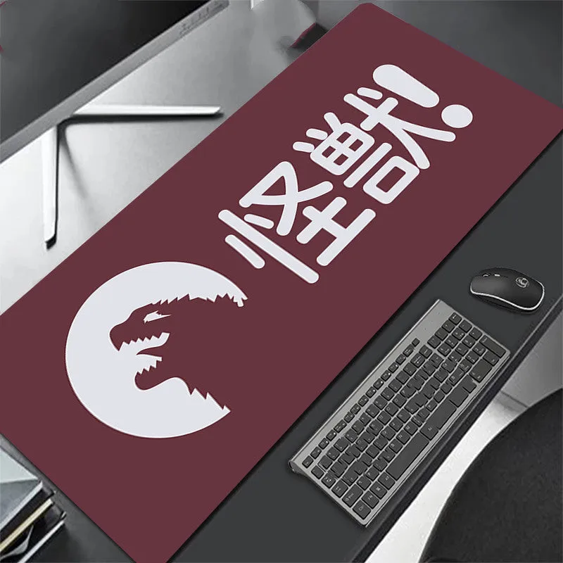 All black extra long mouse pad with precision overlock stitching on a desk