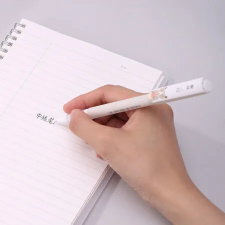Black gel pen with full needle tube tip and plastic body on white background