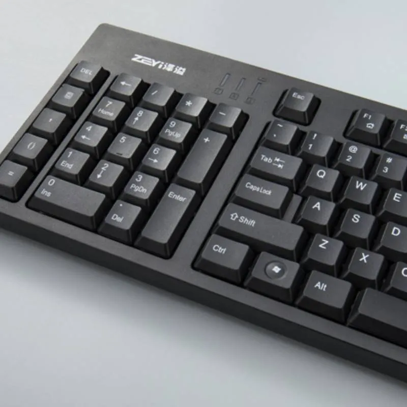 Wired USB keyboard in black with full-size layout and backlit keys