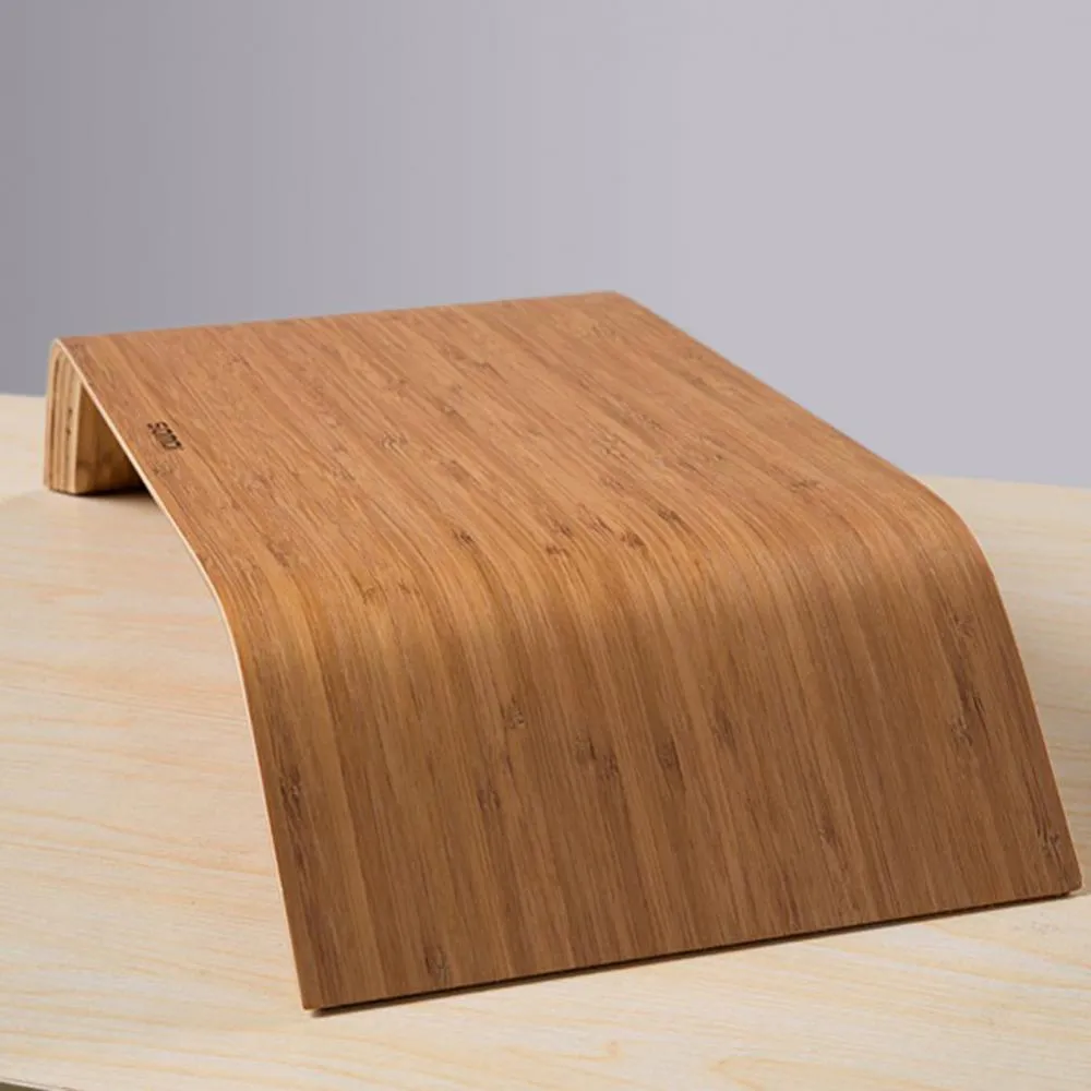 Walnut wood laptop stand with bamboo leather colour finish, 23x51x9cm dimensions, on a desk