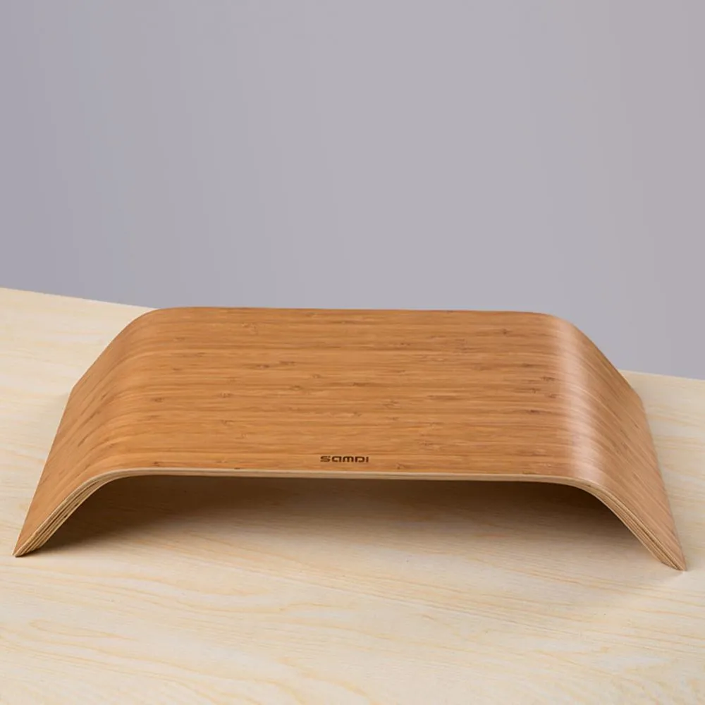 Walnut wood laptop stand with bamboo leather colour finish, 23x51x9cm dimensions, on a desk