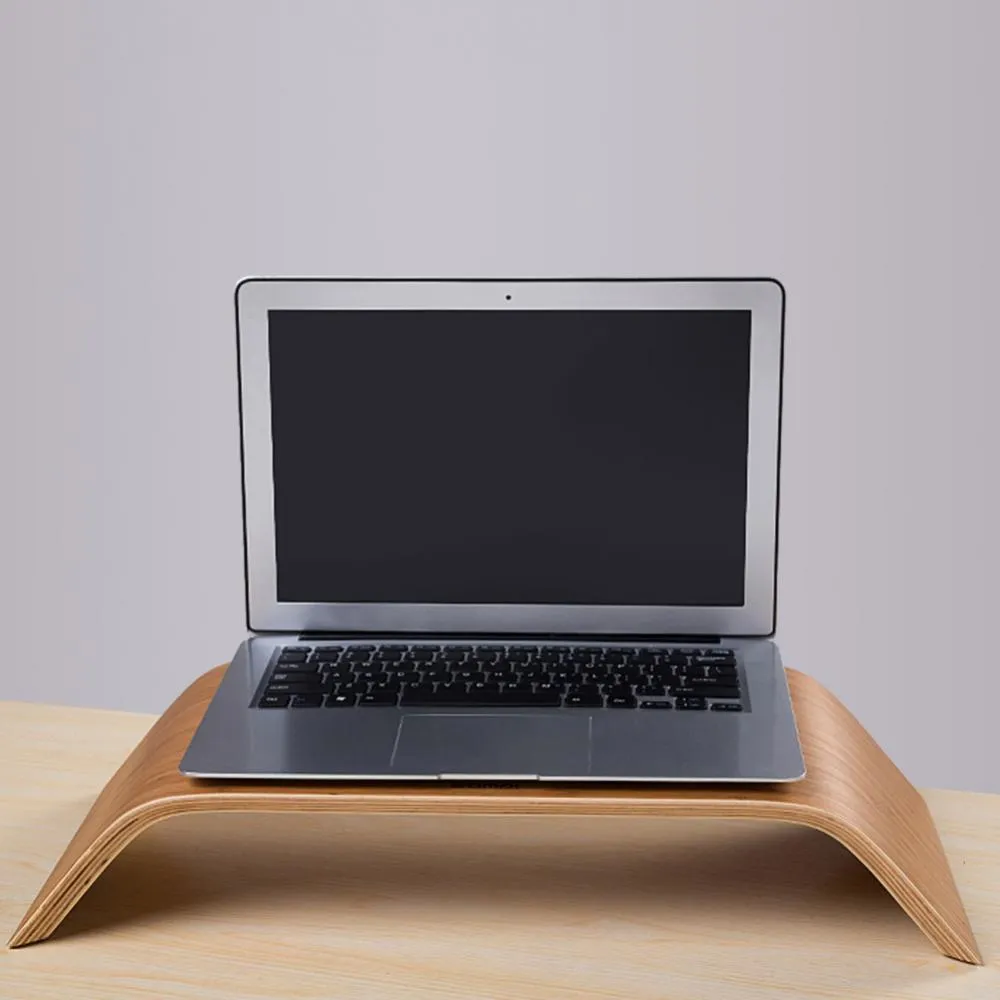 Walnut wood laptop stand with bamboo leather colour finish, 23x51x9cm dimensions, on a desk
