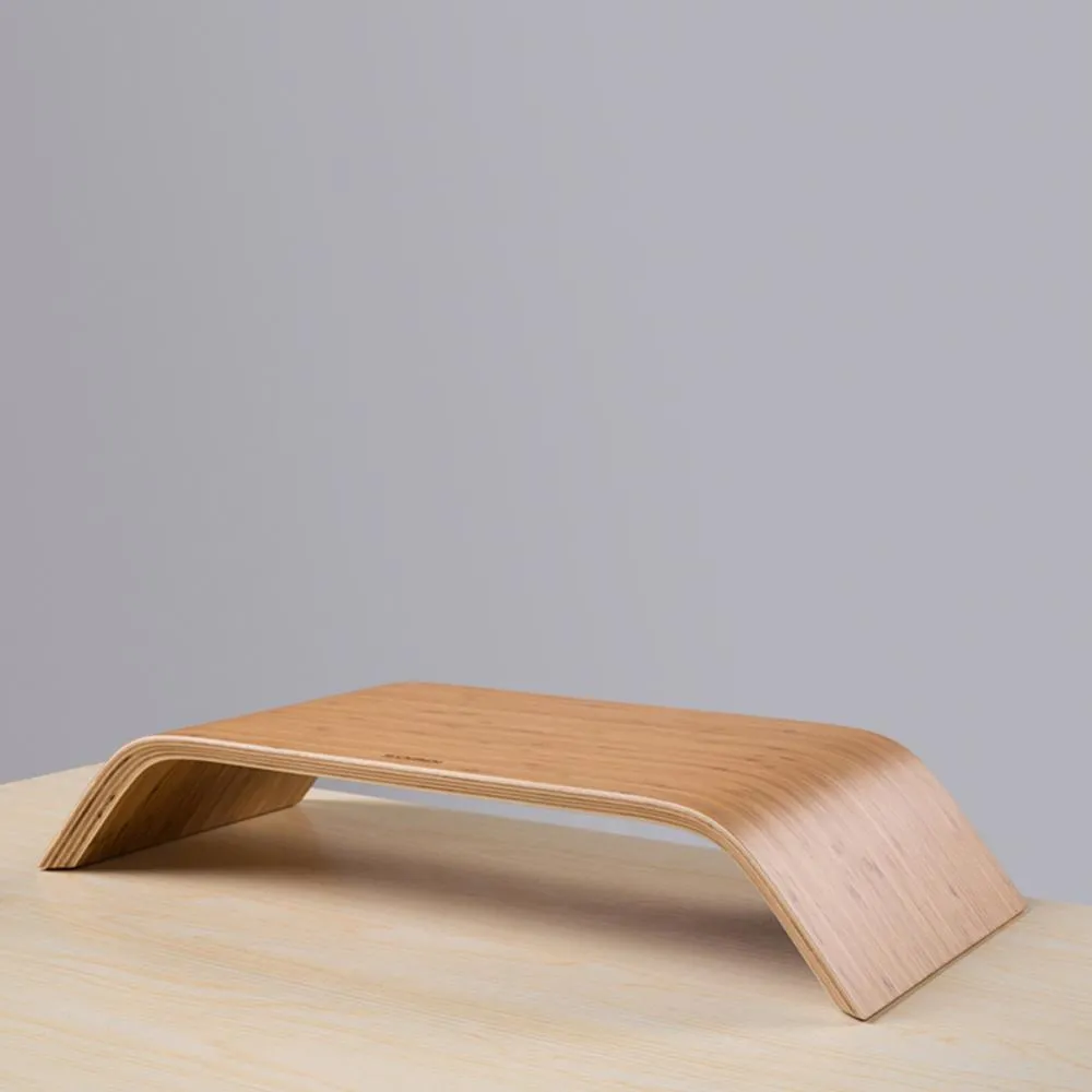 Walnut wood laptop stand with bamboo leather colour finish, 23x51x9cm dimensions, on a desk