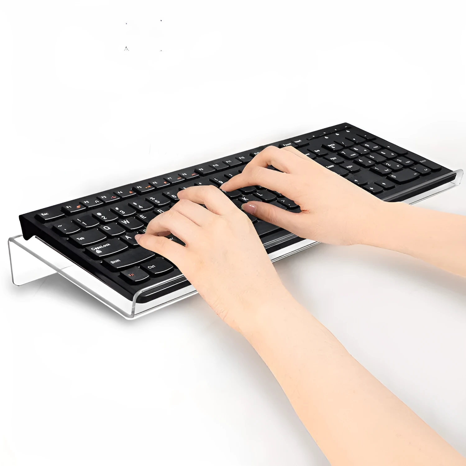 Transparent acrylic tilting keyboard stand for ergonomic typing, 43.2x14x4 cm size on a desk