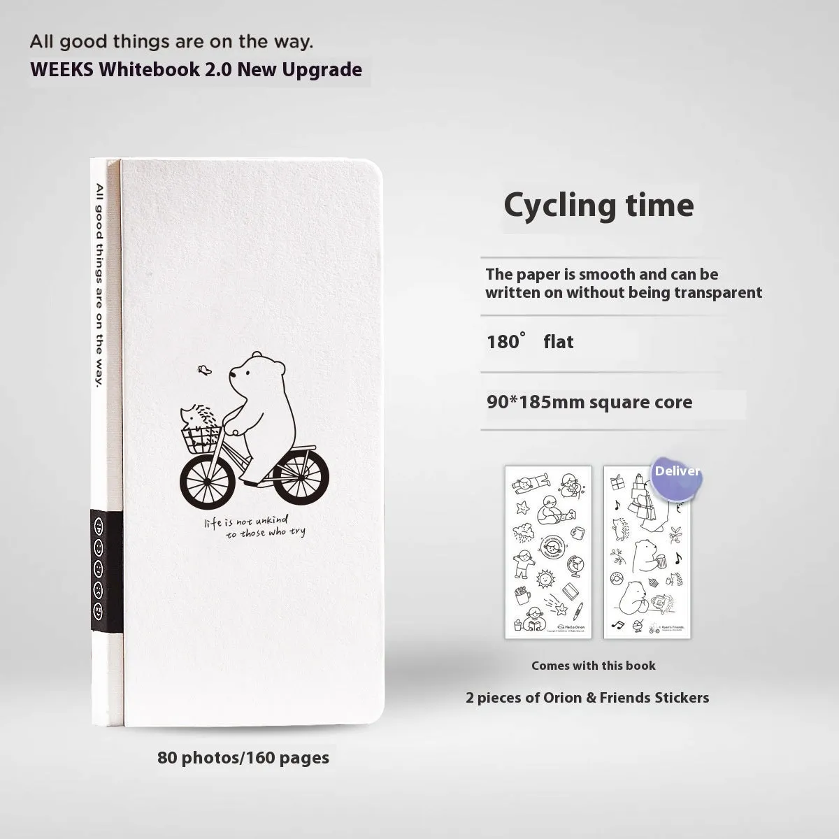 Small white paper notebook with plaid pages, mesh cover, and a pair of decorative stickers.