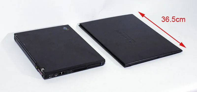 Black laptop sun hood folded flat showing PU outer and light-absorbing velvet inner lining