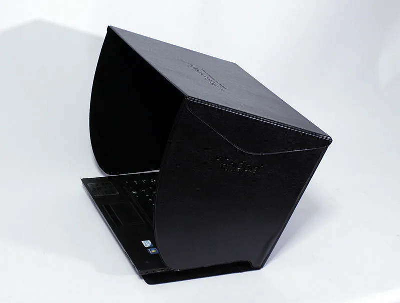 Black laptop sun hood folded flat showing PU outer and light-absorbing velvet inner lining