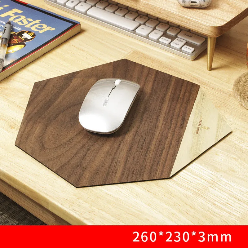 Extra large mouse pad with walnut wood surface and natural rubber base on a desk