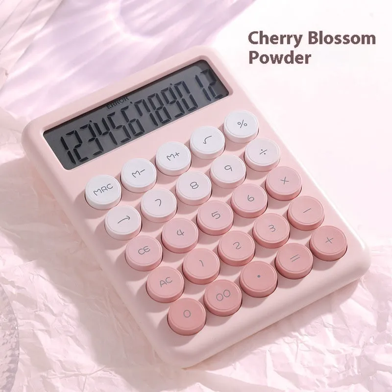 Desktop calculator with gradient colour finish in violet, pink, blue, or mint green on a desk