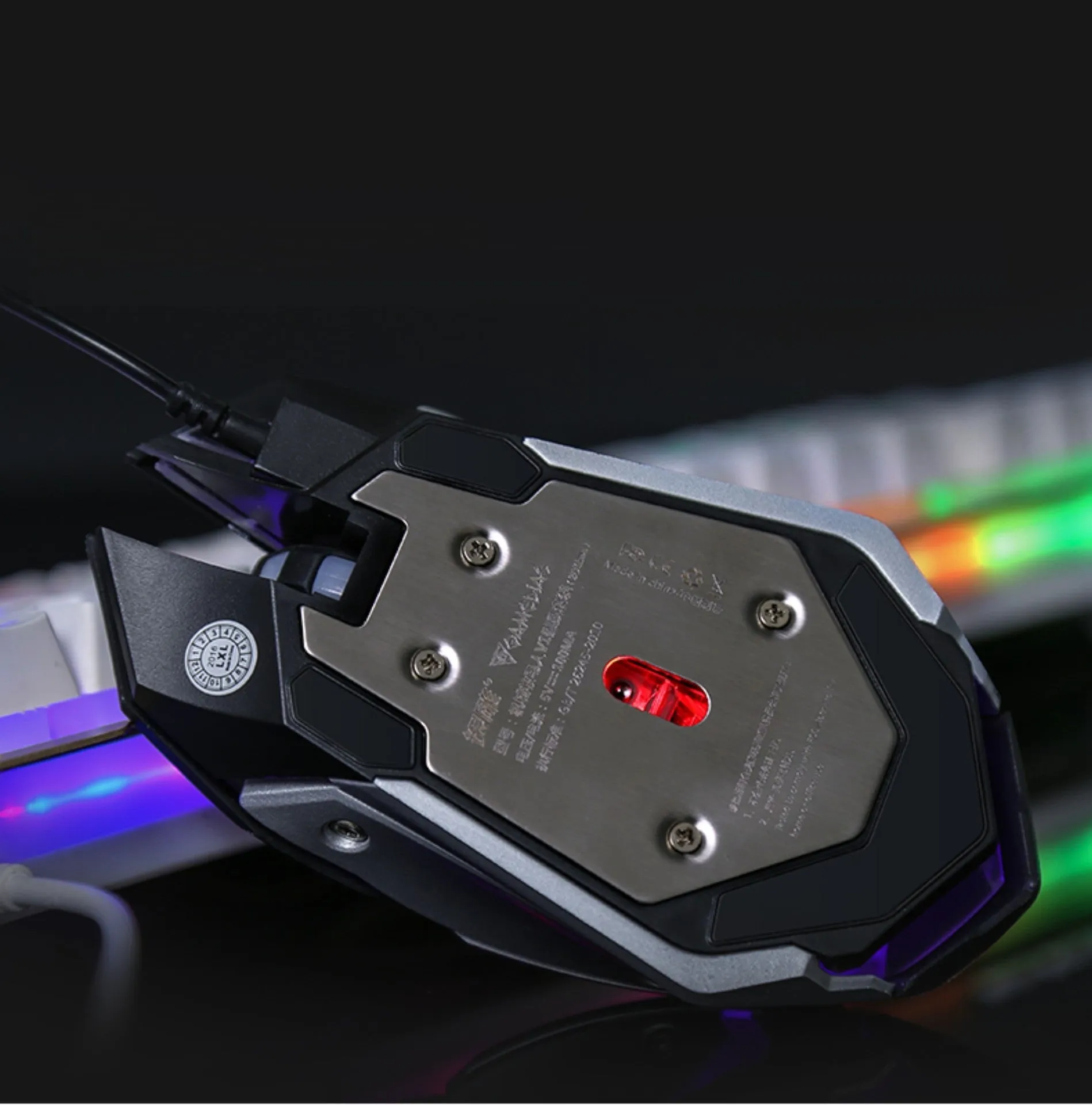 Colourful luminous wired USB mouse with ergonomic shape, 6 buttons, and 1.6m cable on a desk