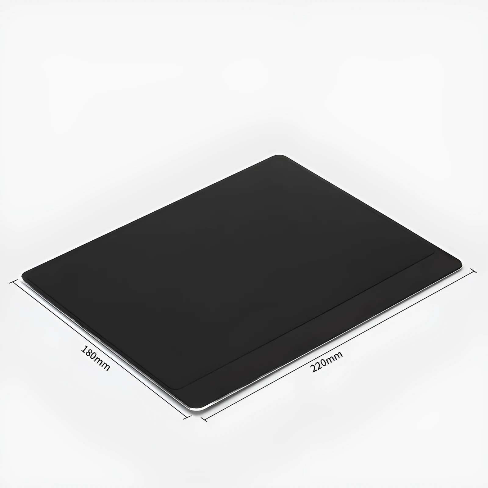 Metal alloy desk mat mouse pad in silver, large size, on a wooden desk