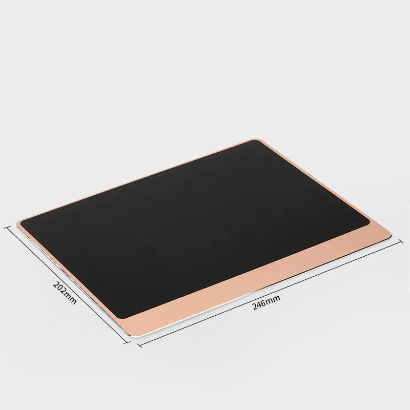 Metal alloy desk mat mouse pad in silver, large size, on a wooden desk