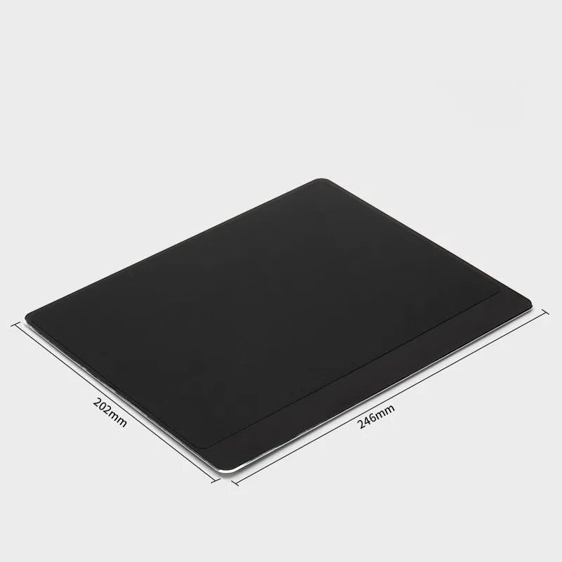 Metal alloy desk mat mouse pad in silver, large size, on a wooden desk