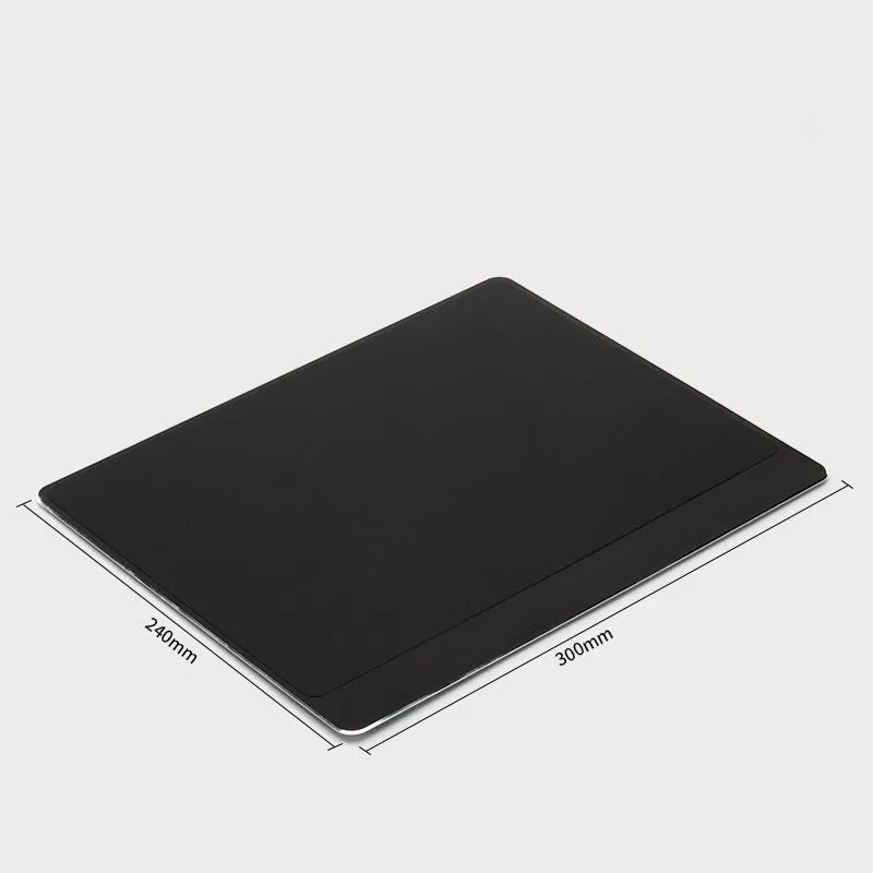 Metal alloy desk mat mouse pad in silver, large size, on a wooden desk