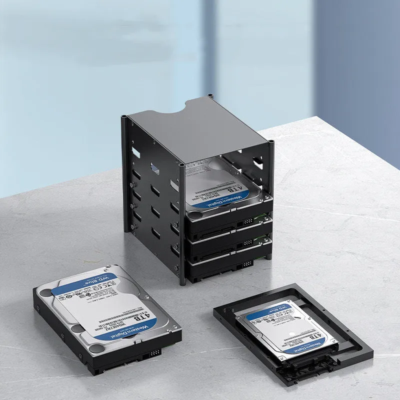 Black metal 5-layer hard drive storage bracket for 3.5-inch disks with screwdriver and screws on a desk