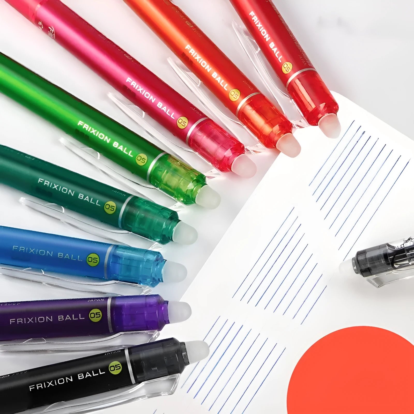 Ten colour press open neutral pen set with 0.5mm fine tips and scrub erasers in black, red, and blue shells.