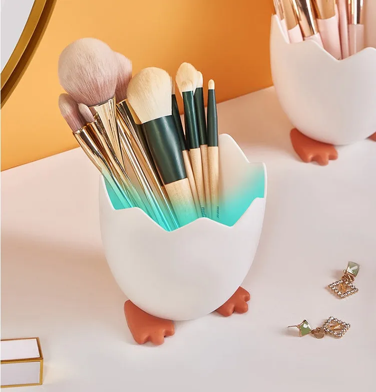 Plastic pen holder in cracked chicken cartoon style for desktop storage