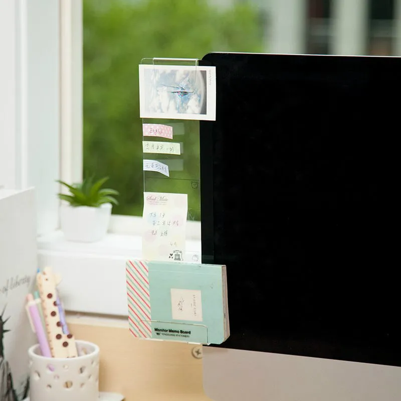 Clear acrylic monitor message memo board with wall suction mount on a computer monitor, left side placement