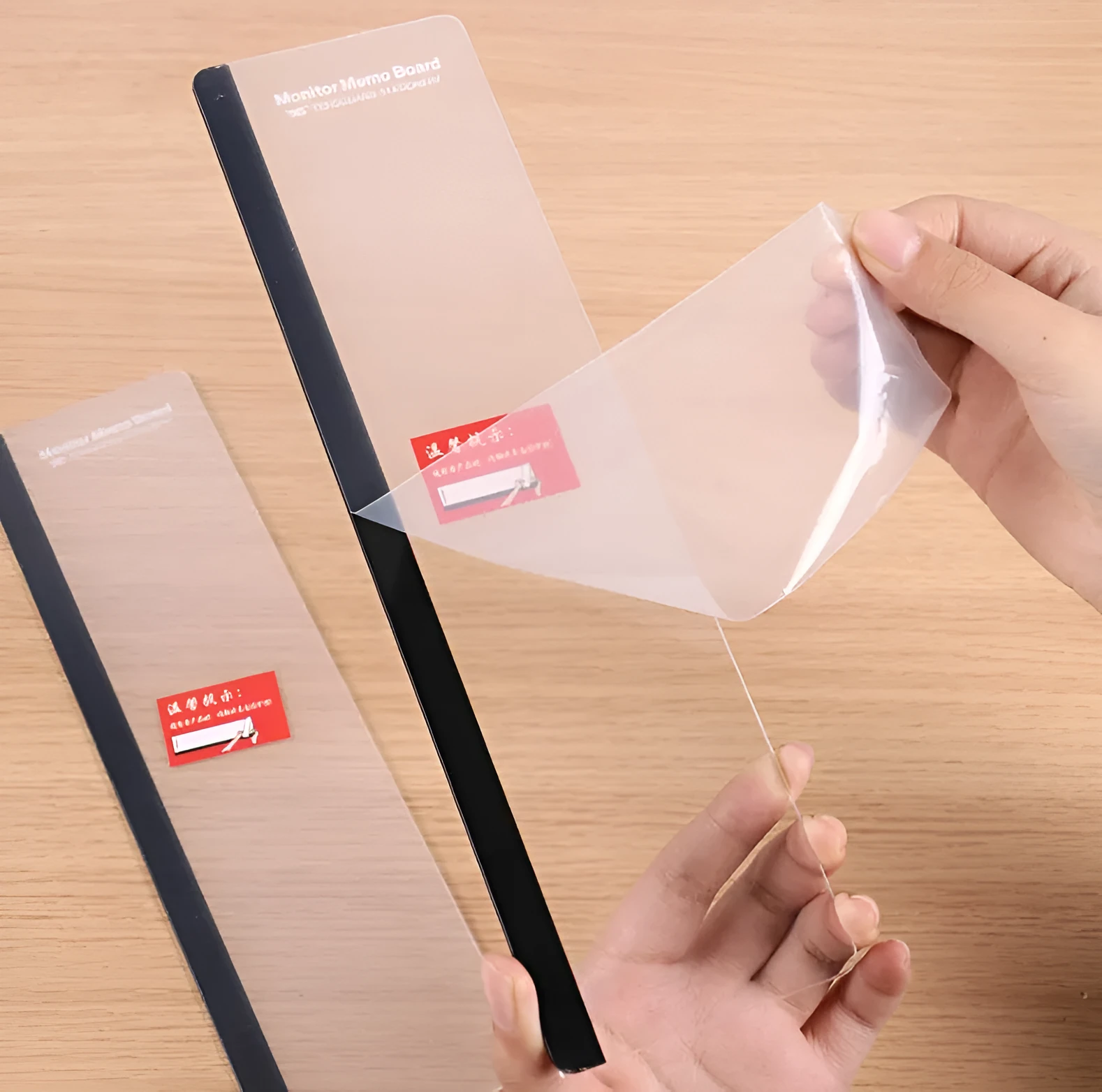 Clear acrylic computer monitor side pane 28cm x 7.8cm with sticky notes attached