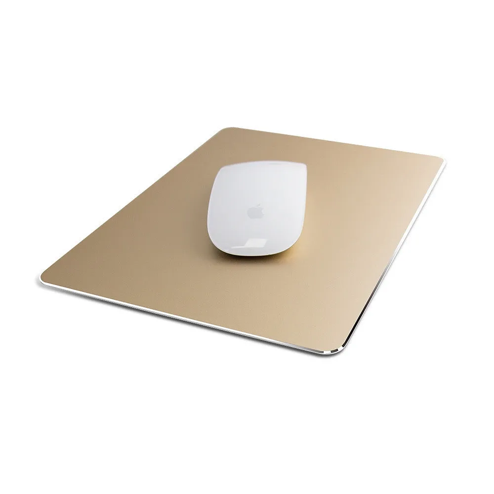 Double-sided aluminium non-slip mouse pad in black on a desk with a mouse and keyboard