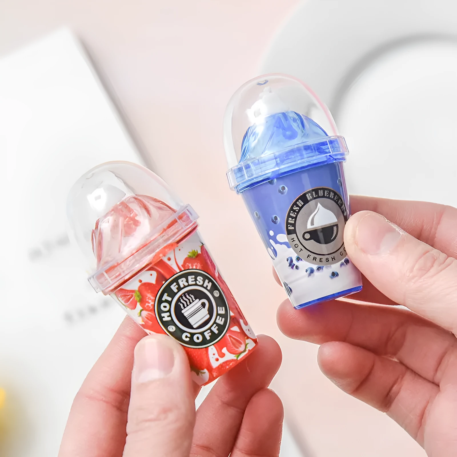 Plastic ice cream shape correction tape with 6 metre length in red shell on white background