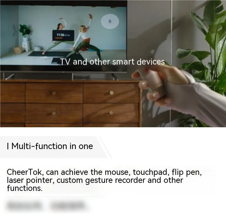 Silver wireless presenter with laser pointer and remote control on table