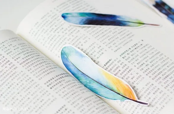 Creative paper feather bookmark 30 piece set, 4.5 x 15.5cm, multi colour, on a white background.