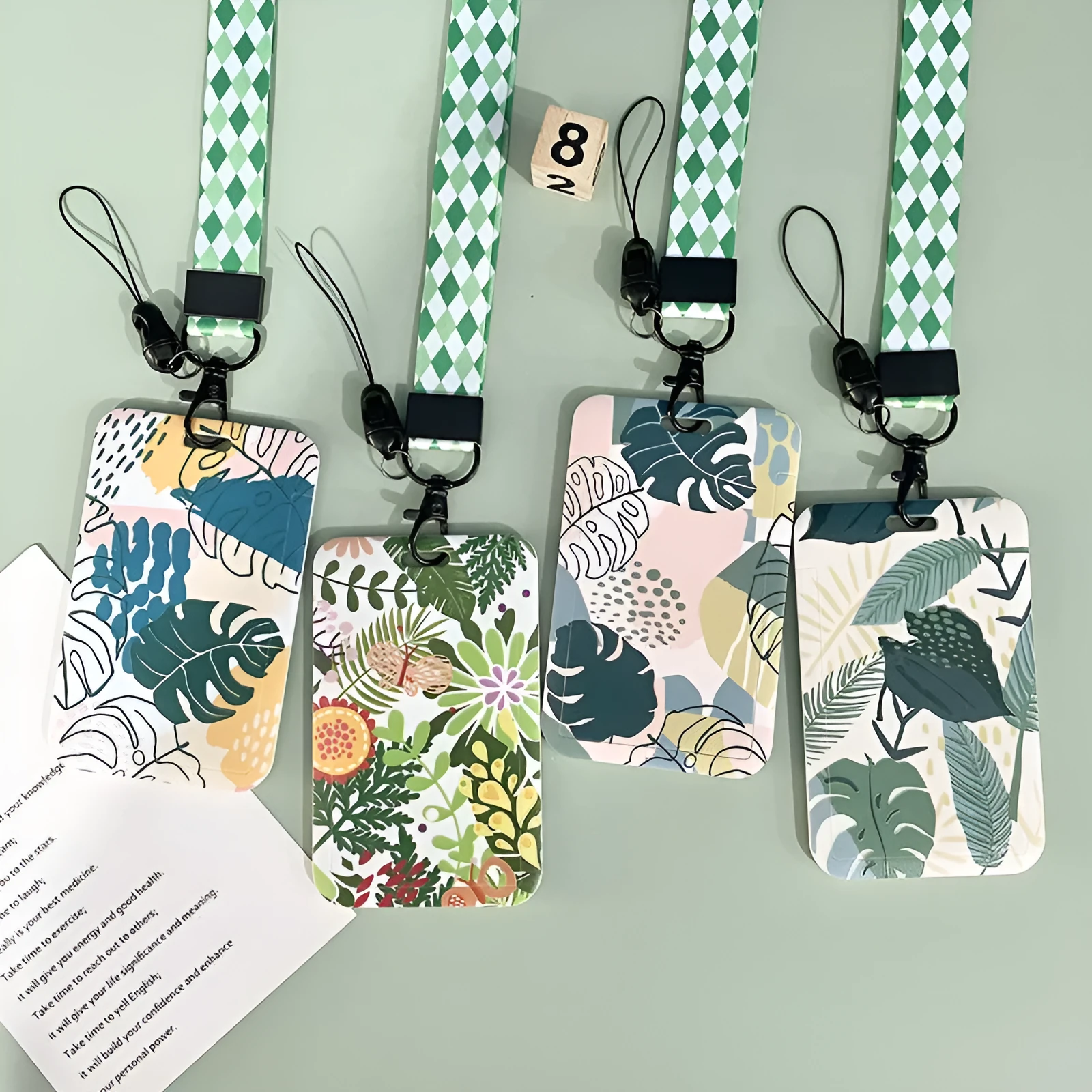 Green plant series simple fashion lanyard card cover with Monstera deliciosa diamond grid design, plastic 110mm x 70mm on a white background