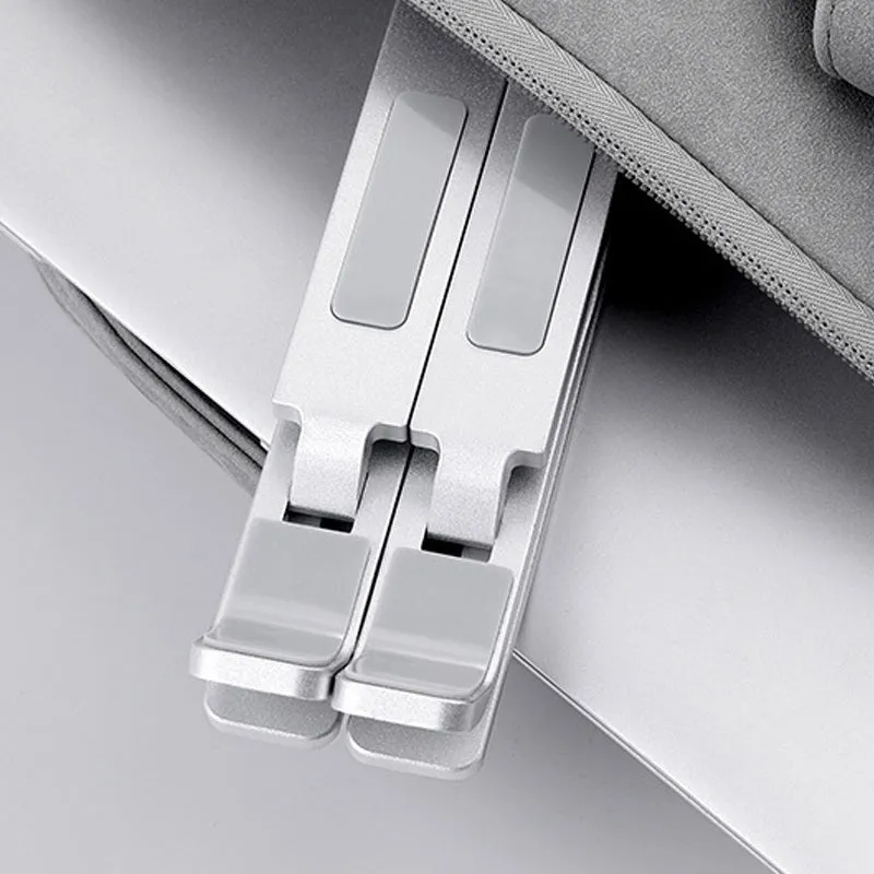 Double-layer aluminium alloy foldable laptop stand in silver with adjustable height up to 310 mm
