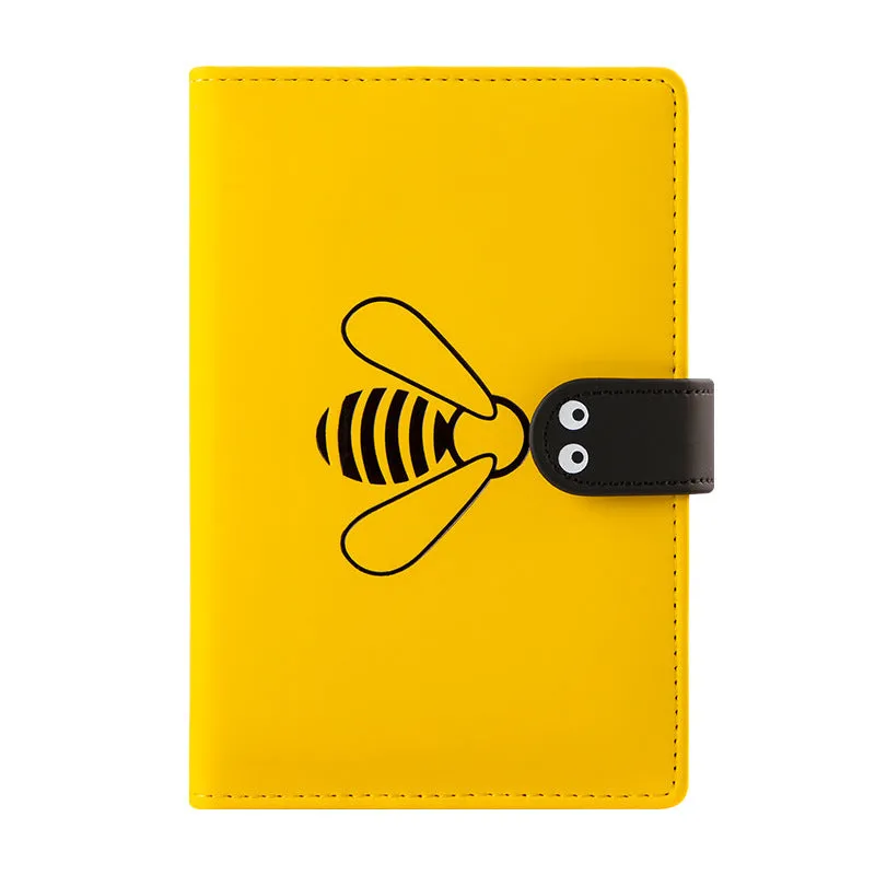 Open B6 notebook with 144 sheets, black PU cover, on a wooden desk