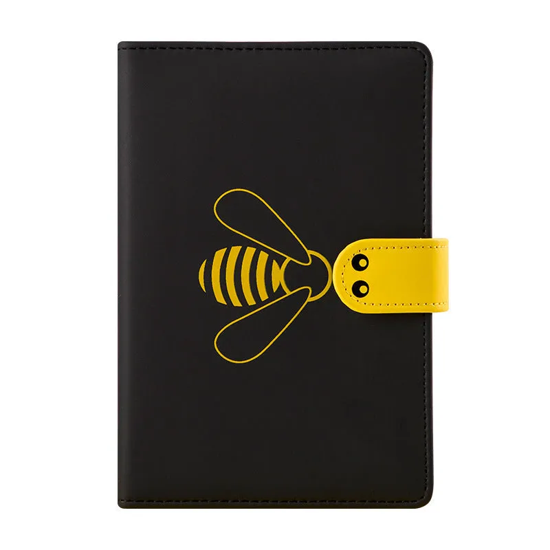Open B6 notebook with 144 sheets, black PU cover, on a wooden desk