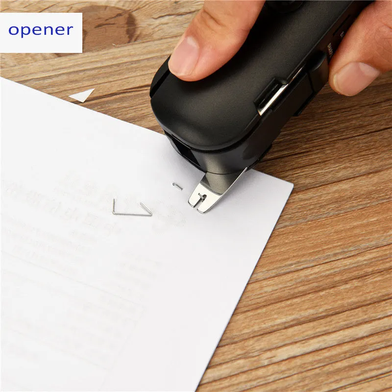 KOONSLED black mini stapler with staple remover on a white surface