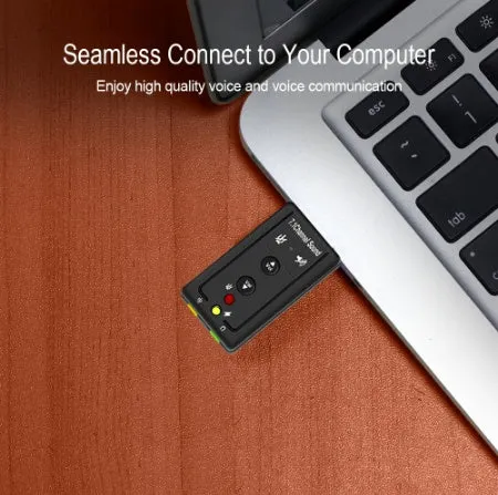 Black external USB sound card with 3.5mm headphone and mic jacks connected to a laptop