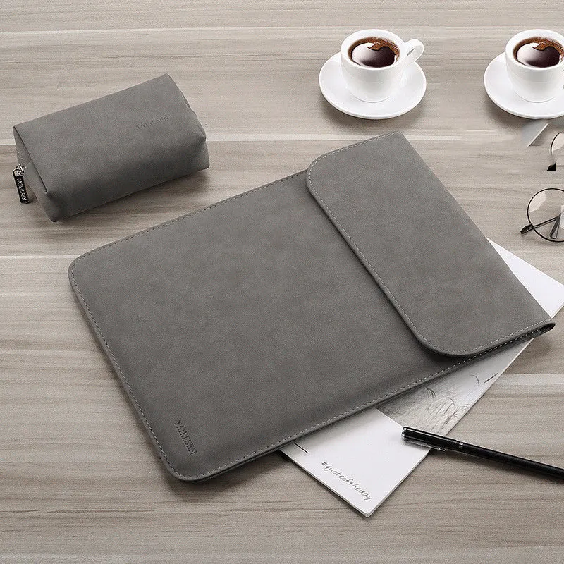Micro velvet laptop liner bag for 13.3 inch notebook, available in multiple colours, lying on a desk