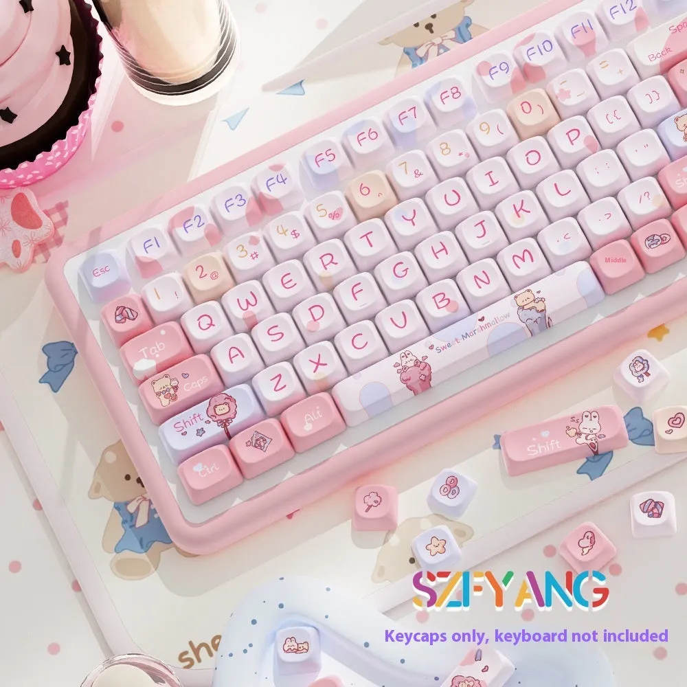 Sweet Cotton Candy pastel pink blue and white key cap set for mechanical keyboards laid out in box