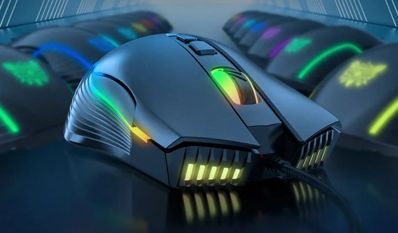 Black wired ergonomic gaming mouse with RGB lighting, seven buttons, four-way scroll wheel, and 1.5m USB cable on a dark surface