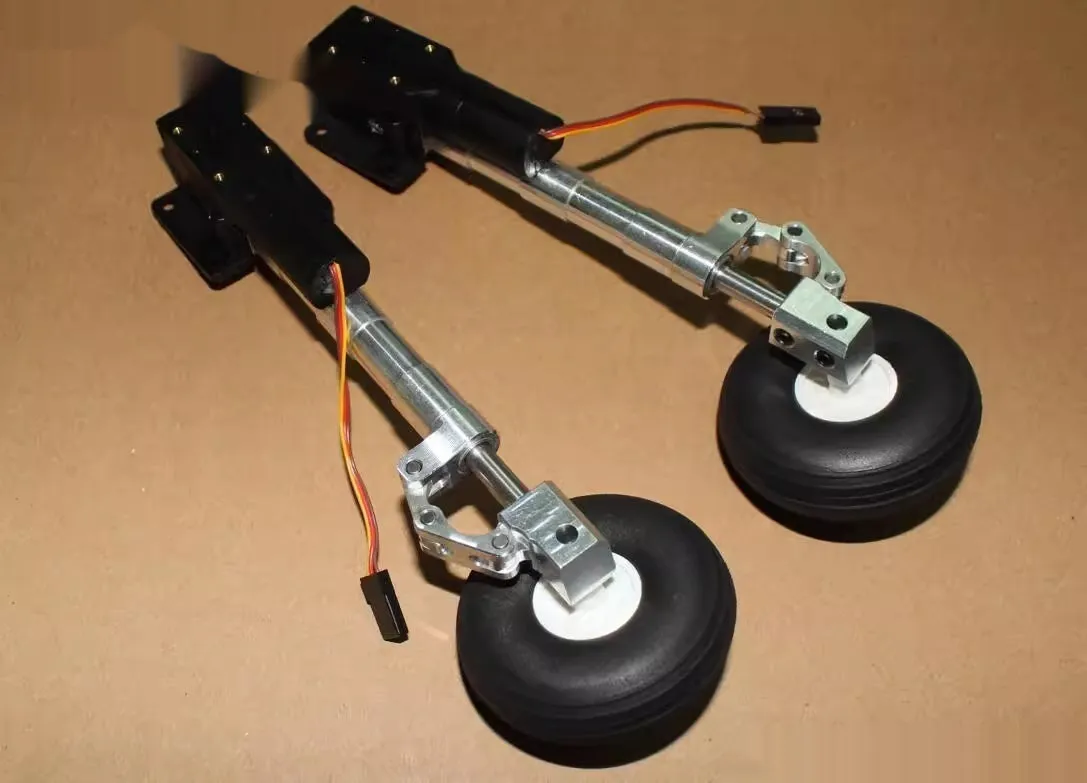 Retractable alloy shock-absorbing landing gear for electric aircraft models with choice of wheel sizes.