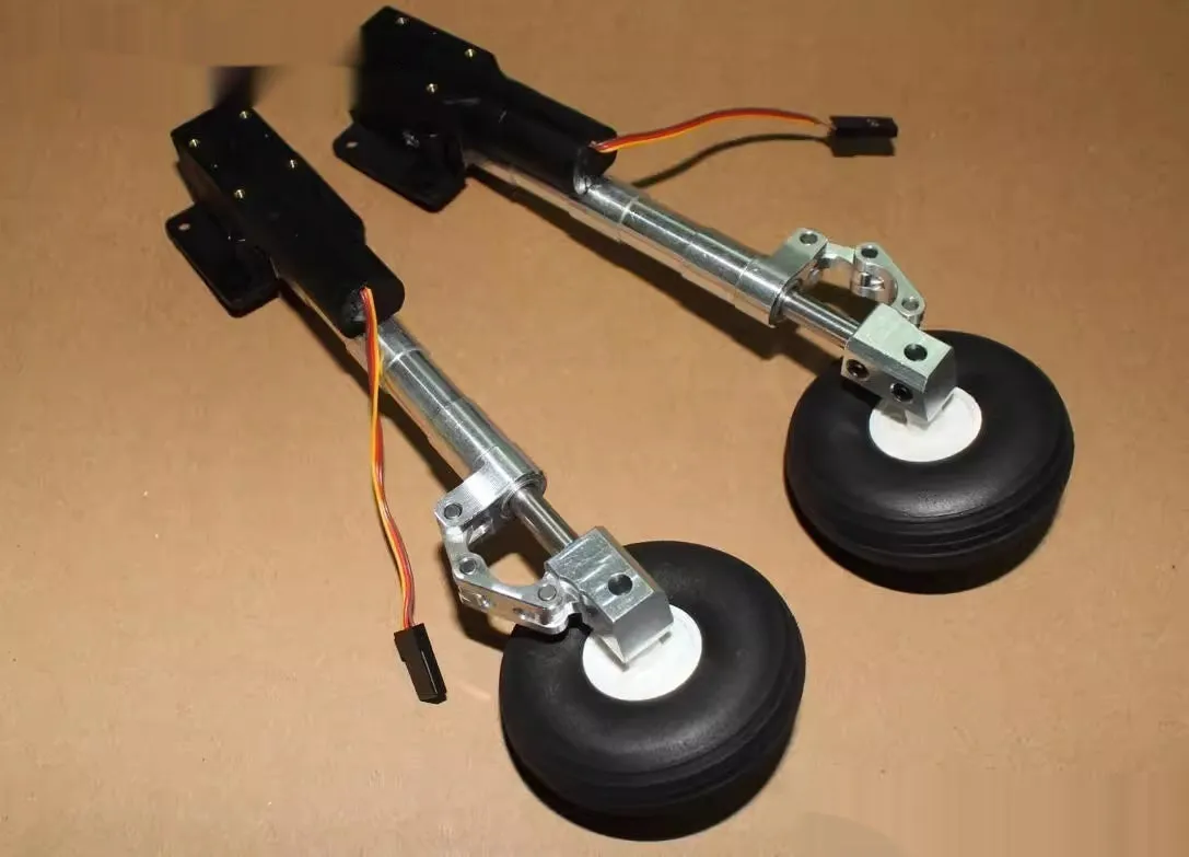 Retractable alloy shock-absorbing landing gear for electric aircraft models with choice of wheel sizes.