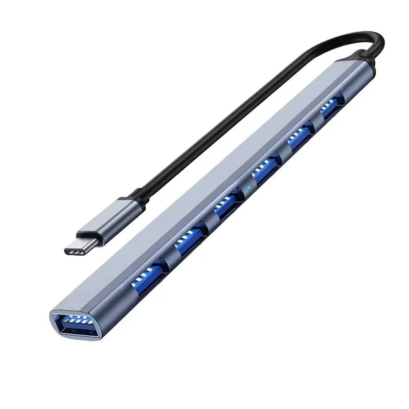 Blue USB-C 7-in-1 docking station with seven USB ports and 0.1m cable on a desk