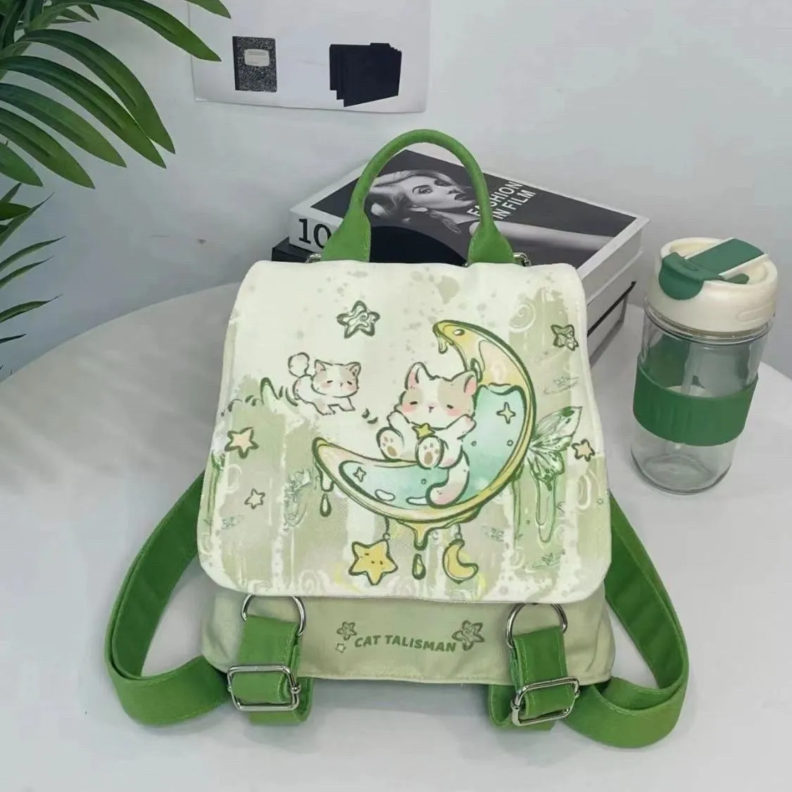 Mint Mambo green cute polyester backpack with spliced design, external sandwich pocket, 23x10x25cm size