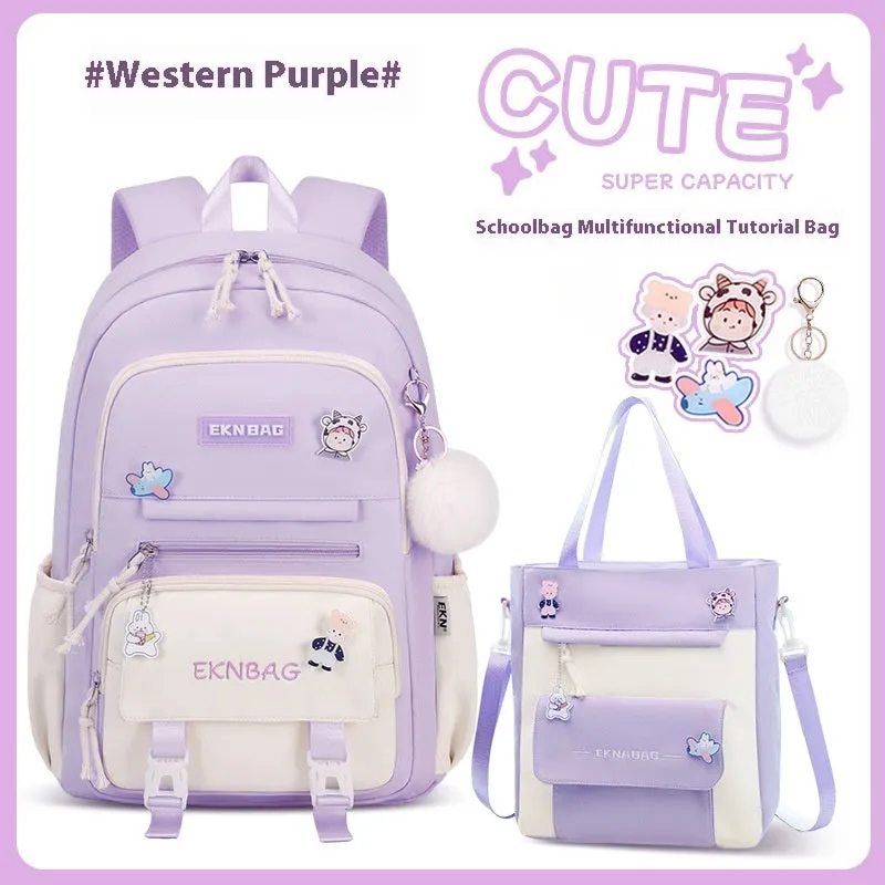 Pink waterproof school backpack set for girls with matching pencil case and tuition bag on a white background.