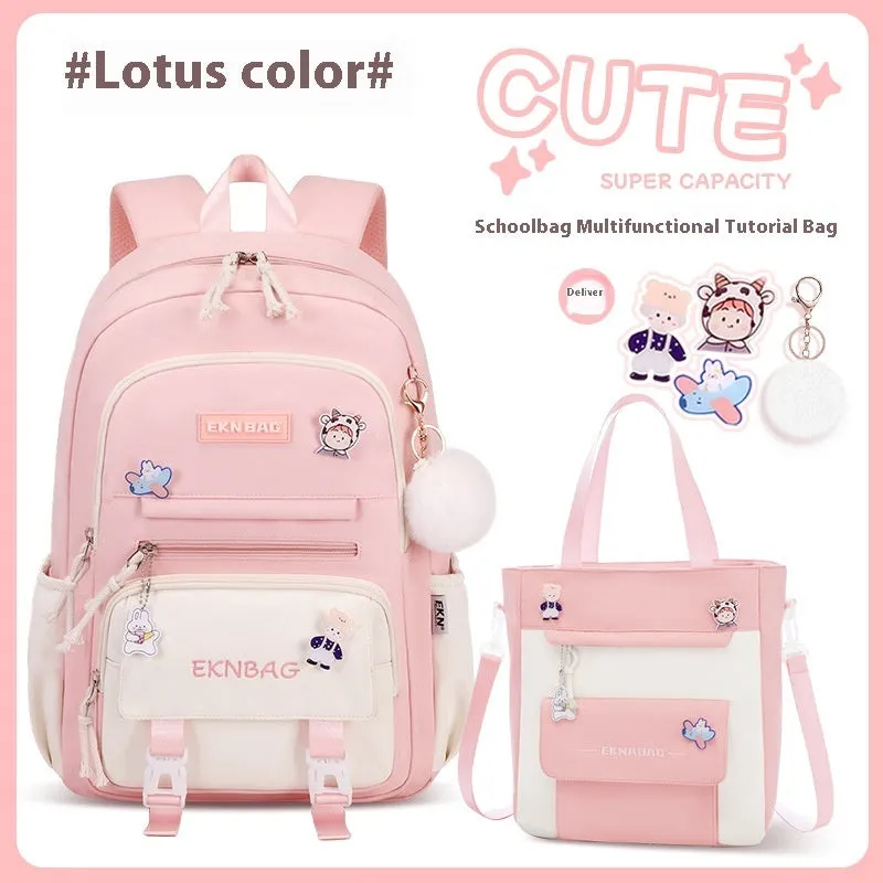 Pink waterproof school backpack set for girls with matching pencil case and tuition bag on a white background.