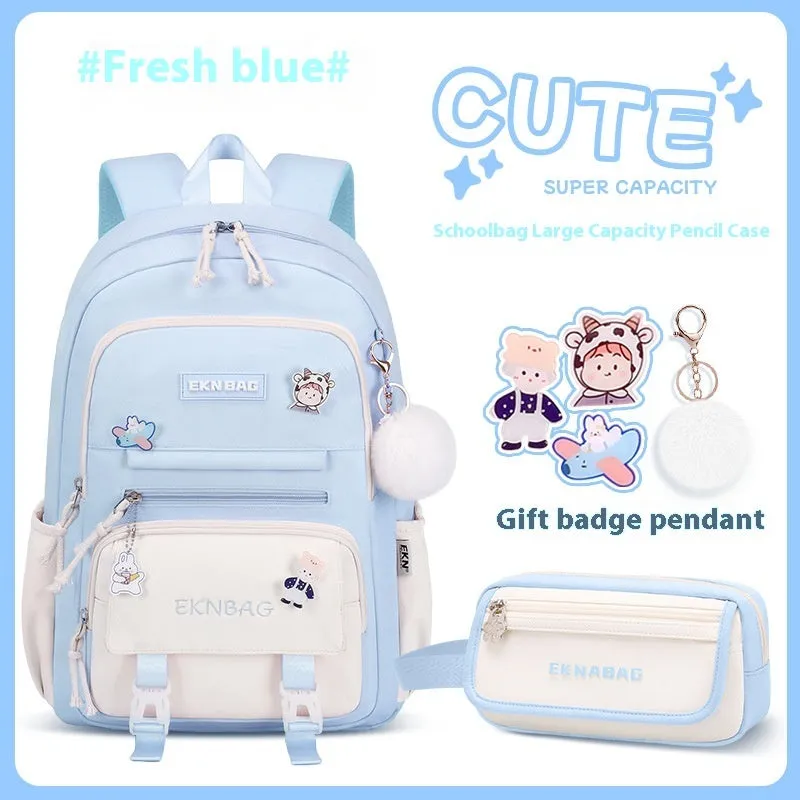 Pink waterproof school backpack set for girls with matching pencil case and tuition bag on a white background.