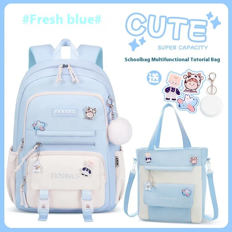 Pink waterproof school backpack set for girls with matching pencil case and tuition bag on a white background.