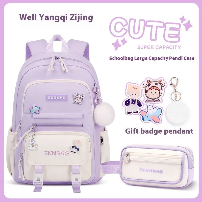 Pink waterproof school backpack set for girls with matching pencil case and tuition bag on a white background.