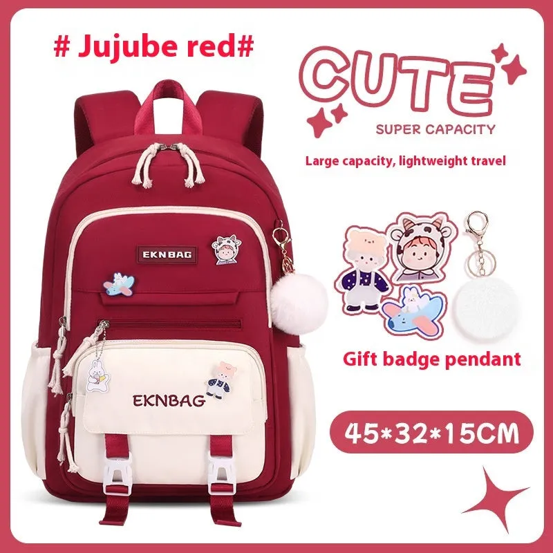 Pink waterproof school backpack set for girls with matching pencil case and tuition bag on a white background.