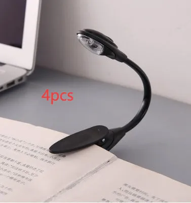 Black clip-on LED book light with gooseneck arm and small LED head, 26cm total length