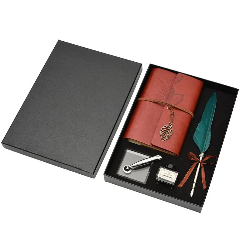 Feather dip pen gift set with copper pen, ink bottle, acrylic base, and antique book in box