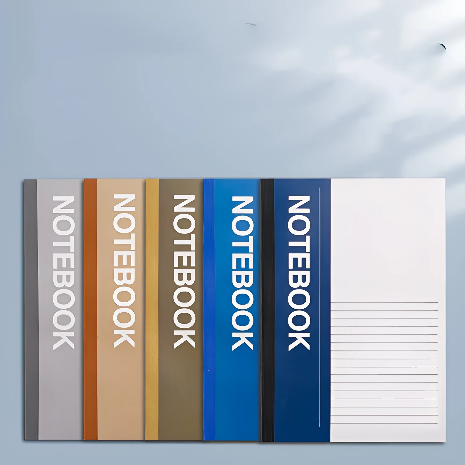 Notebook with smooth thick paper in B5 size, open to a page of handwritten notes, showing clean writing with minimal bleed-through