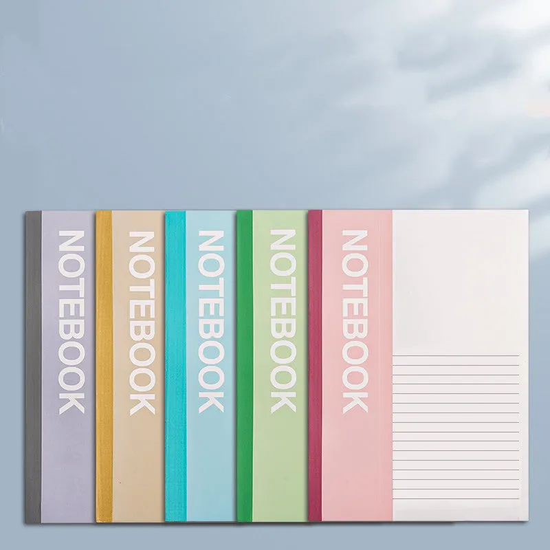 Notebook with smooth thick paper in B5 size, open to a page of handwritten notes, showing clean writing with minimal bleed-through